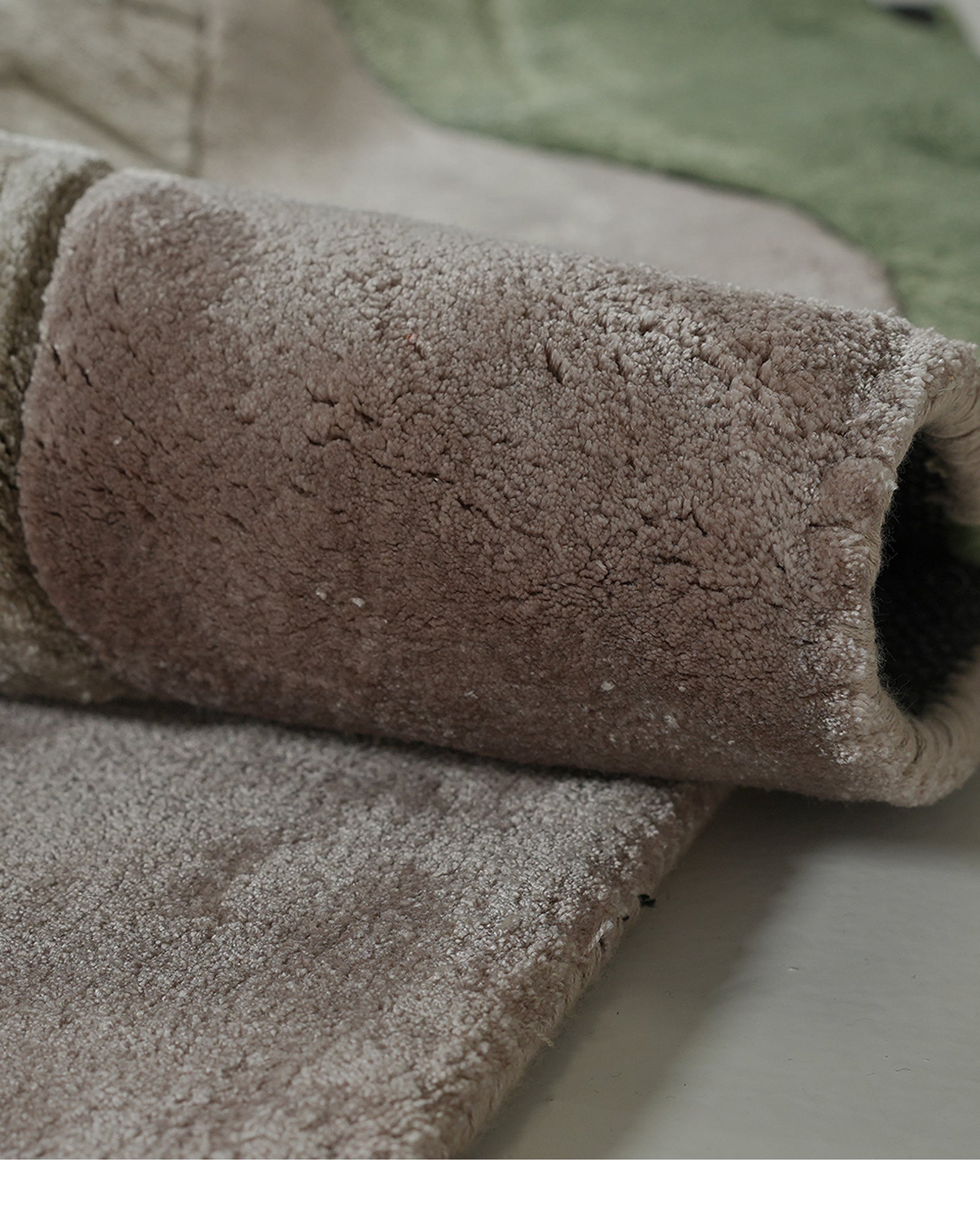 Folded View Forest Green and Taupe Organic Abstract Hand-Tufted 100% Bamboo Silk Rug