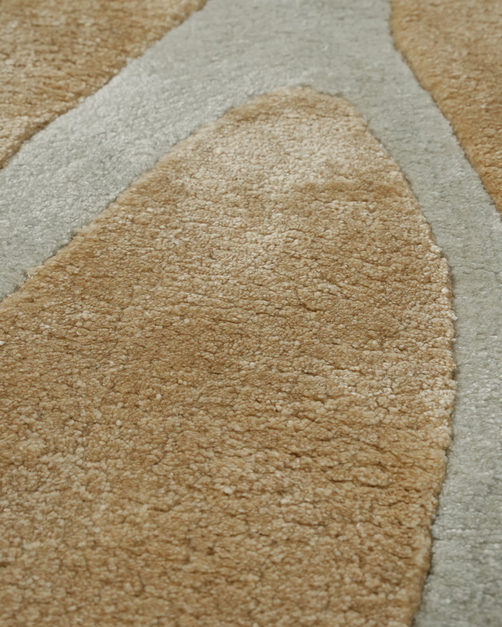 Close View Gold and Silver Vein Organic Shaped Hand-Tufted Bamboo Silk Rug