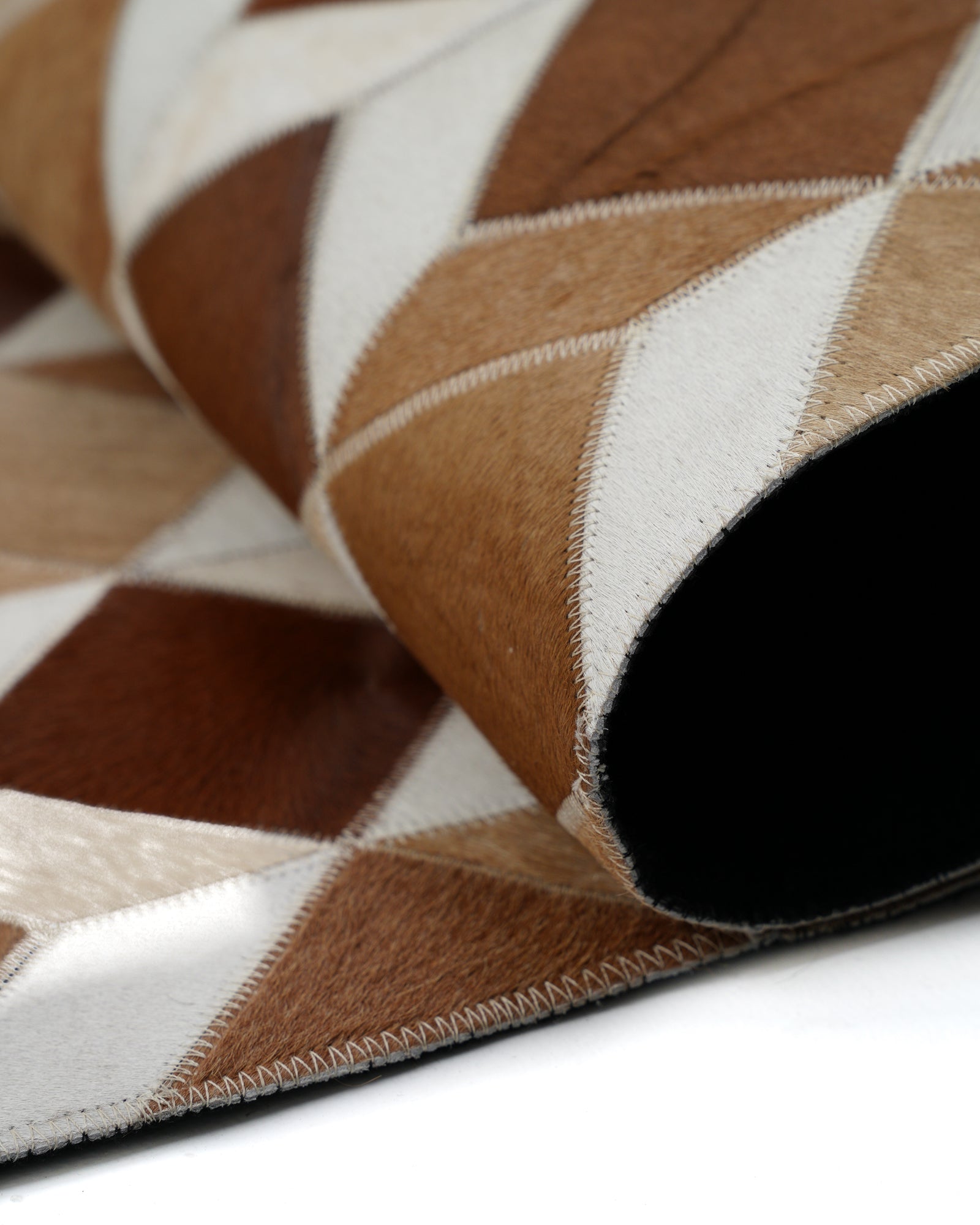Folded View Caramel Brown and Ivory Diamond Harlequin Hair-on Leather Patchwork Rug
