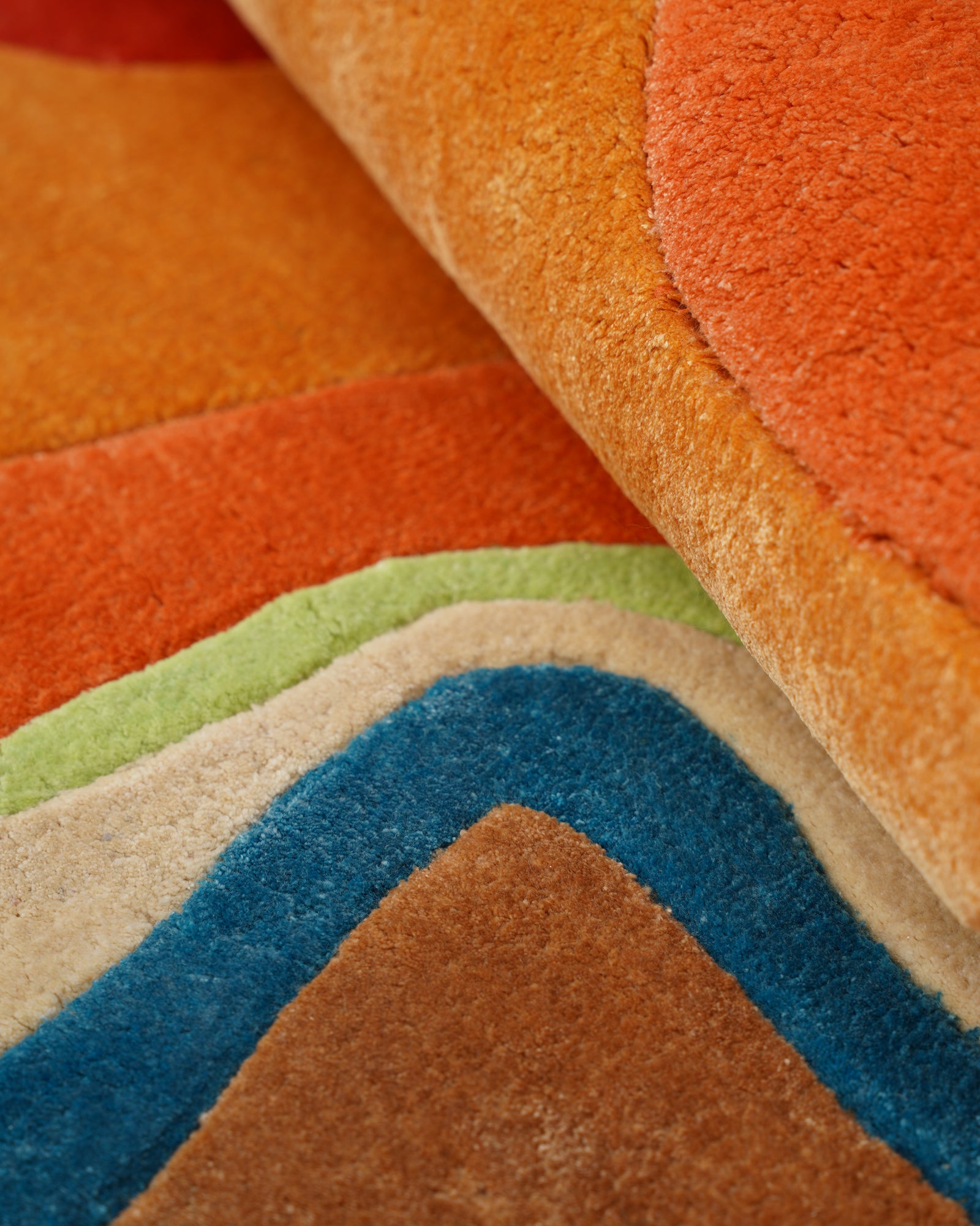 Orange Sculpted Hand Tufted Rug - Folded Shot