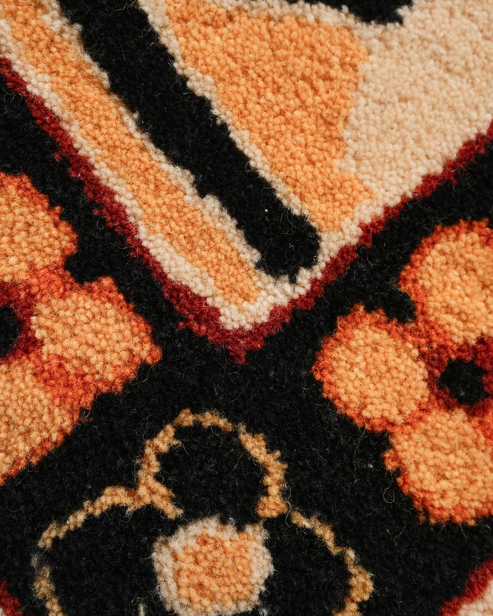 New Zealand wool pile texture with tribal weave detail