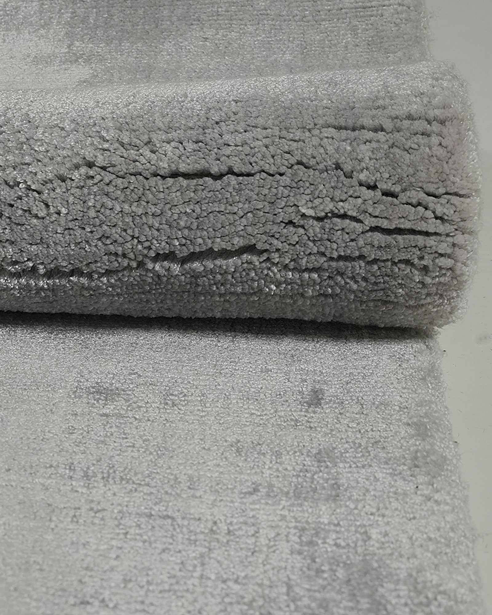 Folded View Silver Grey Solid Tonal Loom-Knotted 200x300 cm Bamboo Silk Rug